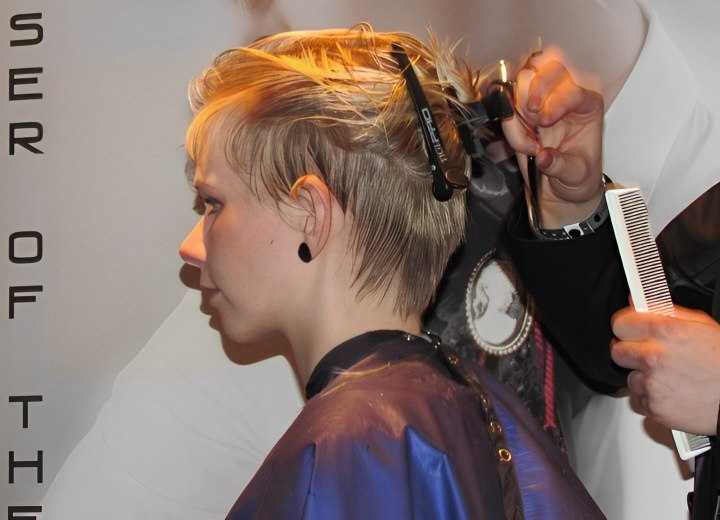 Hair salon cape with snap closure
