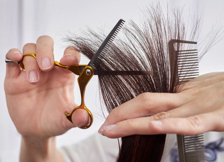 Cutting hair with thinning scissors