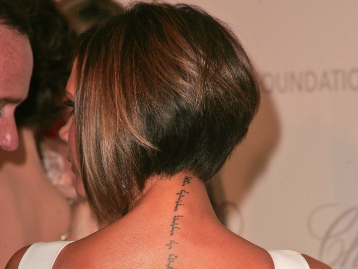 Victoria Beckham with her hair cut in an angled bob