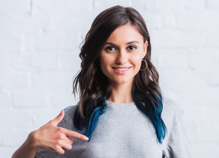 Long dark hair with blue tips