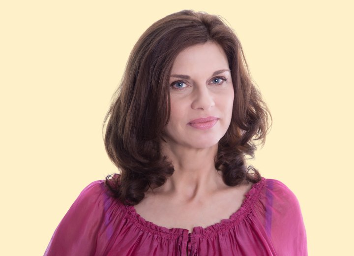 Woman with wavy brown hair