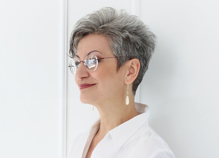 Gray hair cut in a pixie