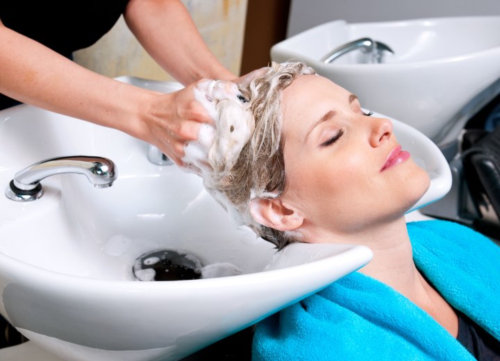 Haidressing shampooing a client's hair