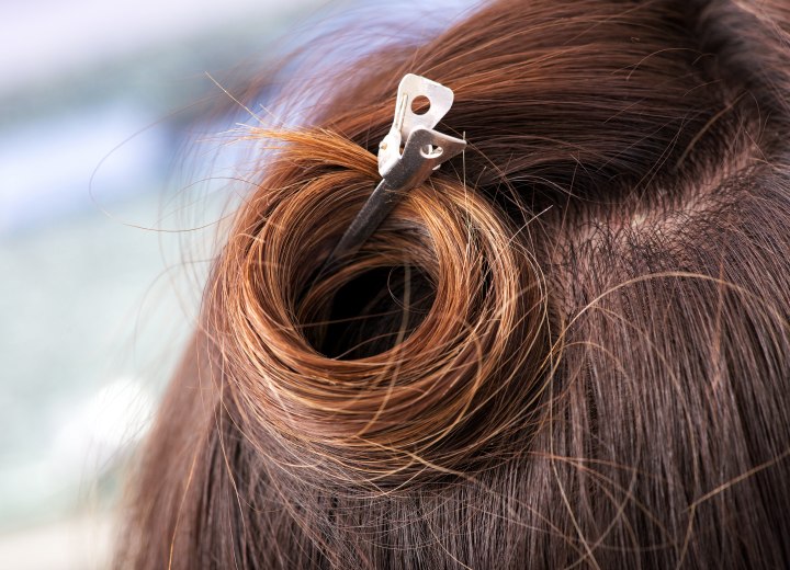 Hair with a pin curl