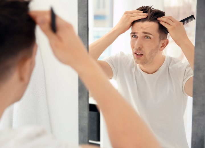 Guy who is worried about his receding hairline