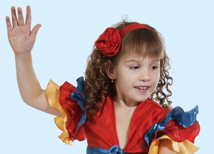 Girl with her hair styled into ringlets