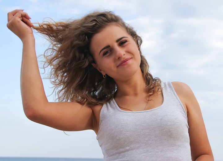 Young woman with long wavy hair