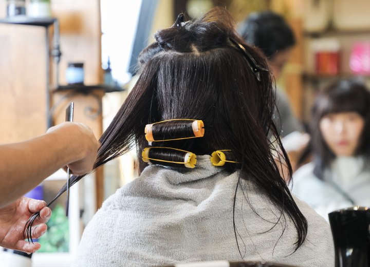 Wrapping hair for a perm