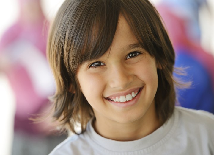 Young boy with long hair