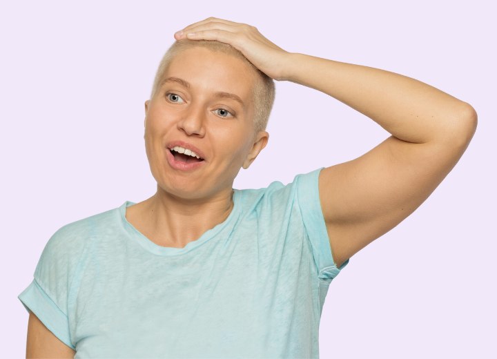 Woman with super short buzzed hair
