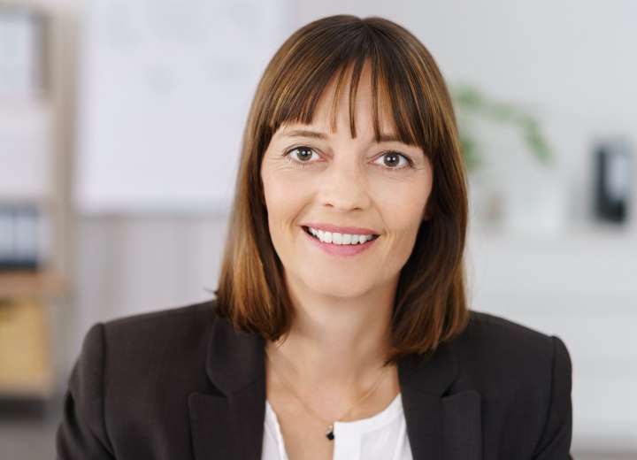 Career woman with shoulder length hair