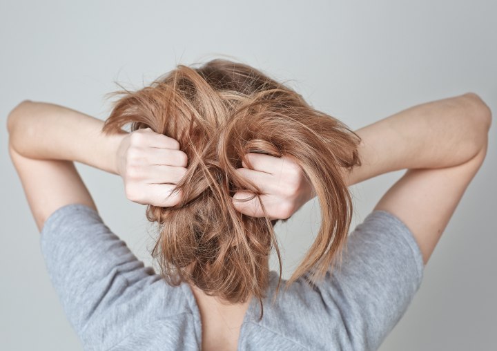 Woman who is worried about her changing hair