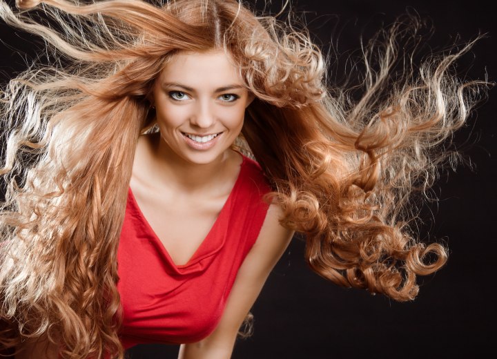 Young woman with curly hair extensions