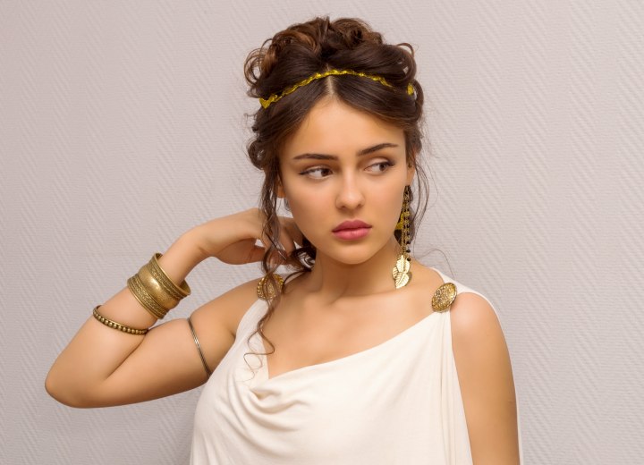 Woman wearing an ancient Greek dress and hairstyle
