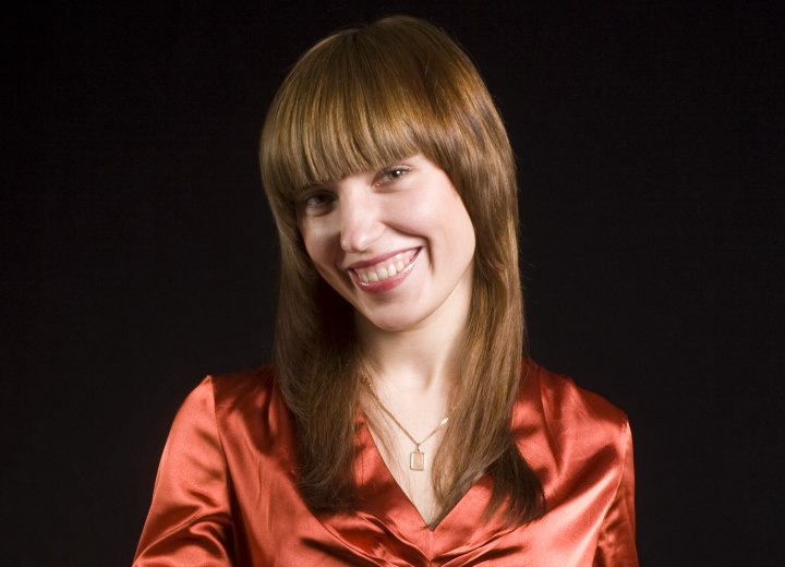 Woman wearing her hair long with bangs