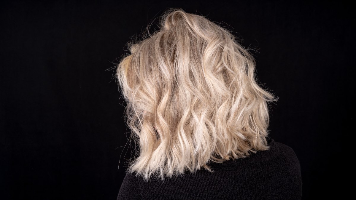 Image of Curly v-cut bob