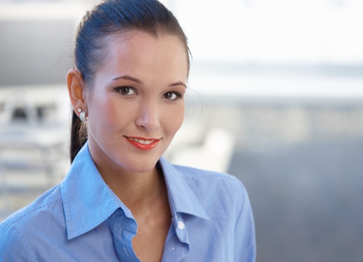 Professional look for the office with blouse and ponytail