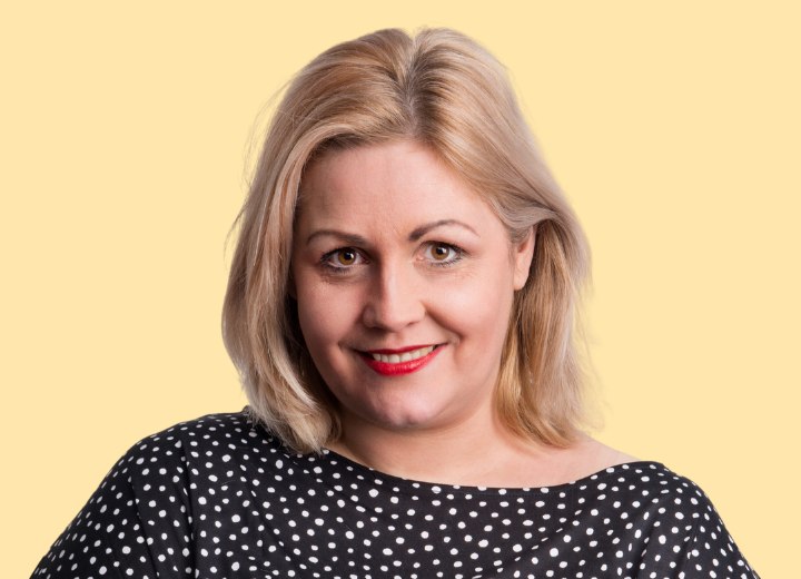 Overweight woman wearing her hair in a long bob