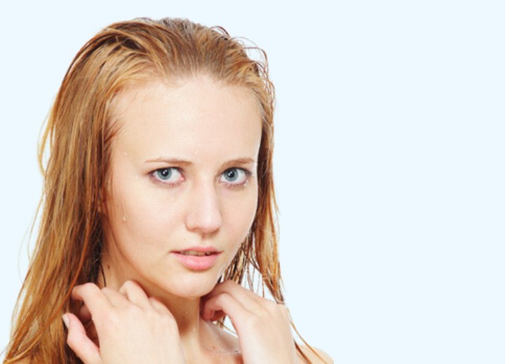 Girl with wet and freshly shampooed hair