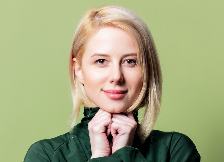 Blonde woman wearing green