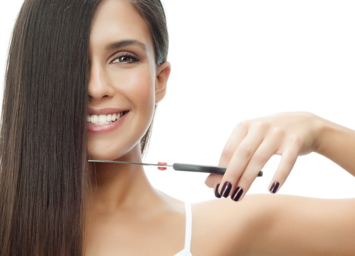 Woman who is chopping her long hair off