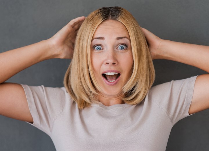 Blonde hair with visible dark roots