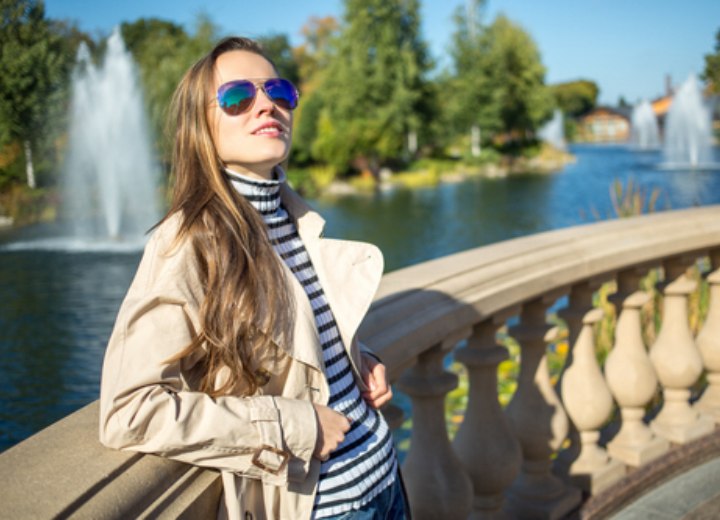 Woman with long hair enjoying the sunshine
