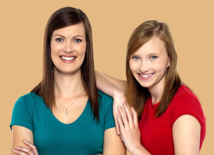 Mother and daughter with matching hairstyles