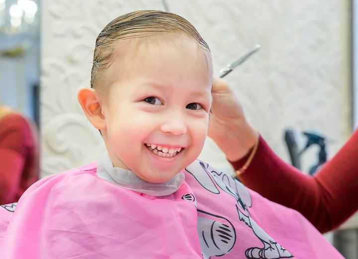 Young boy in a kid friendly hair salon