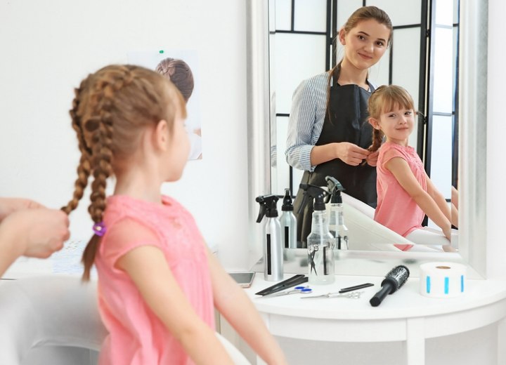 Little girl in a kid friendly hair salon