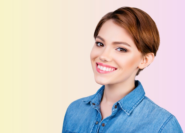 Hair stylist with her own hair in a pixie cut