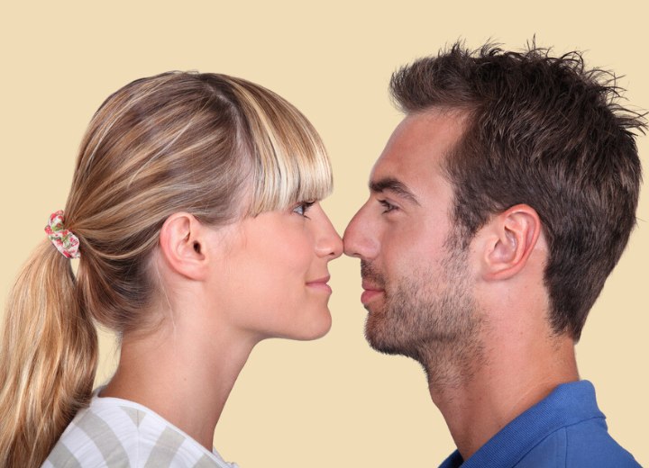 Man and woman with different hair lengths