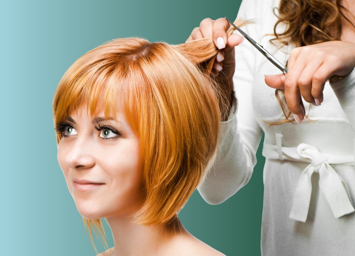 Hair salon client getting an angled bob cut