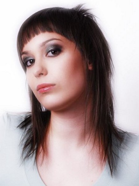 Trendy haircut with a very short fringe