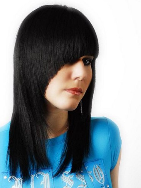 Long hairstyle with an angle cut side fringe