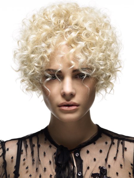 Short blonde hair with spiral curls