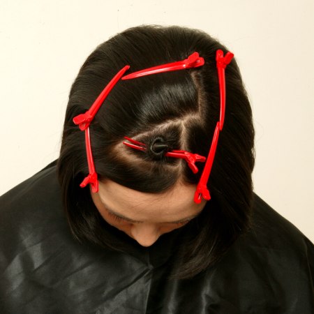 Hair sectioning into an offset reverse triangle