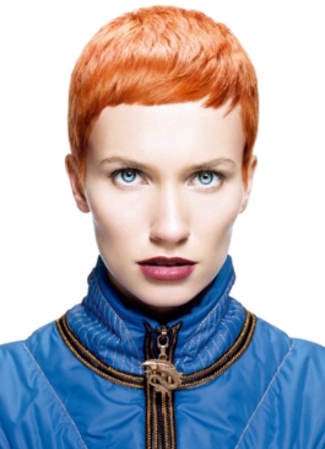 Very short Annie Lennox haircut with a flashy red haircolour