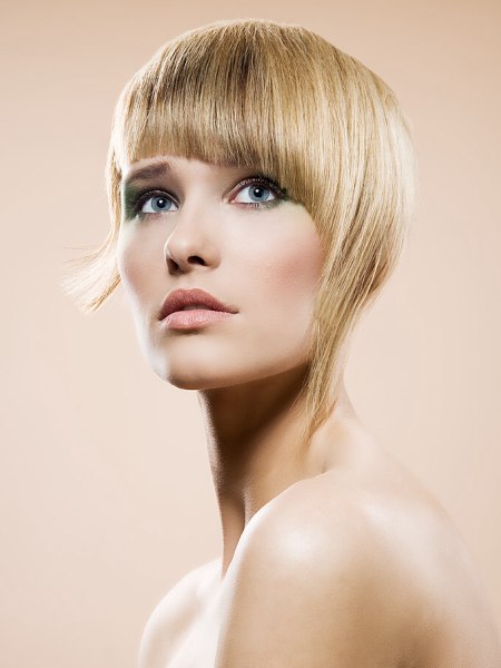 Razor cut hair with asymmetrical side strands