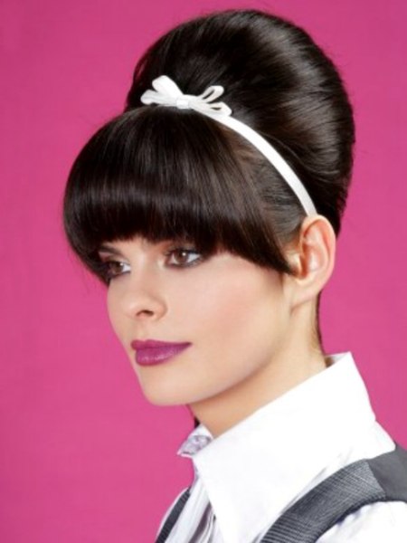 Girly retro 60s up-style with a hair band