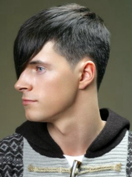 Men's haircut with clipped sides and a long top - Side view