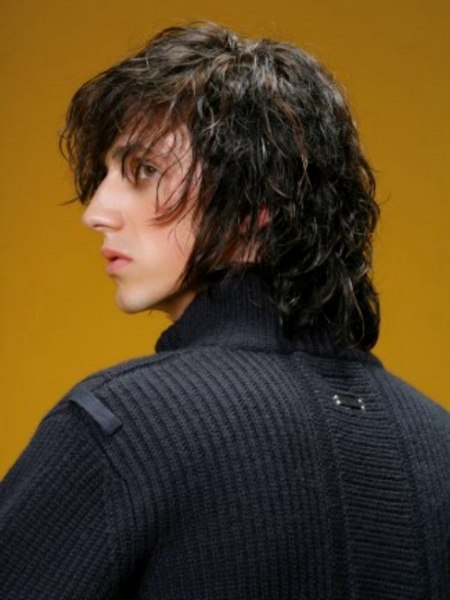 Rear view of a long men's haircut that is very low maintenance