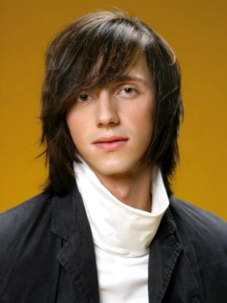 Sleek long hairstyle with curved bangs for men