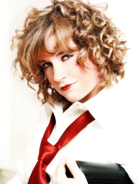 Mid-length curled hairstyle with a curved fringe