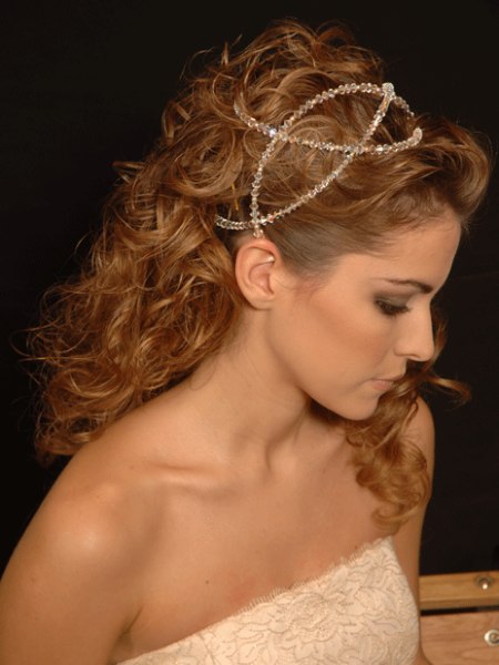 Wedding hairstyle with a headpiece and a Grecian feel