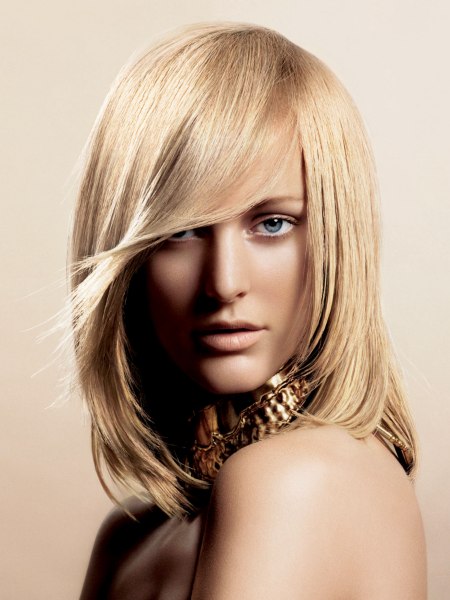 Medium-length hairstyle with a tapered fringe