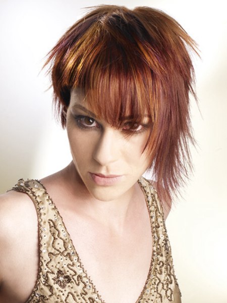 Asymmetrical hairstyle with contrasting colors in copper and gold