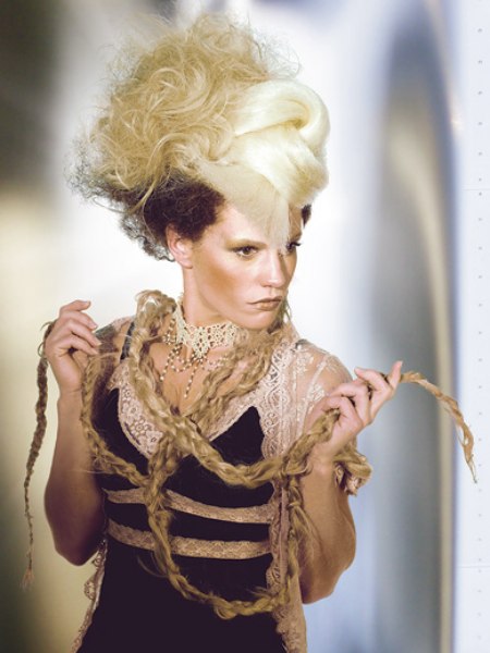Extravagant Marie Antoinette inspired hairstyle with a huge knot