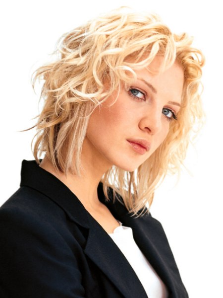 Medium long bob with curls and partly straight hair
