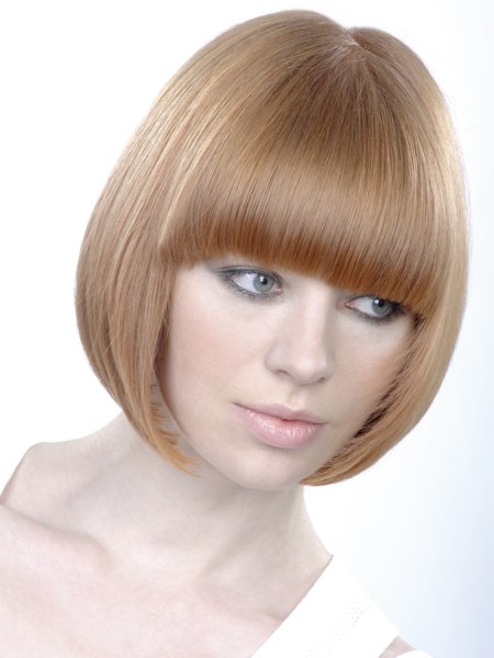 Modern round bob with straight round brush blow drying